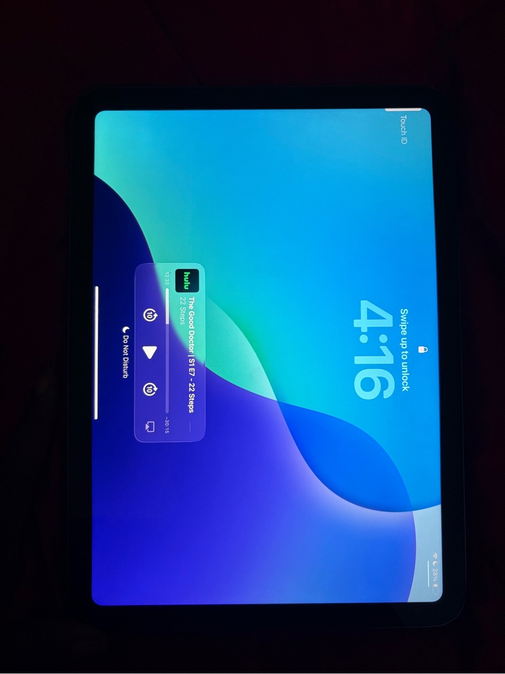 Apple Tablet in Black with Blue-Green Display